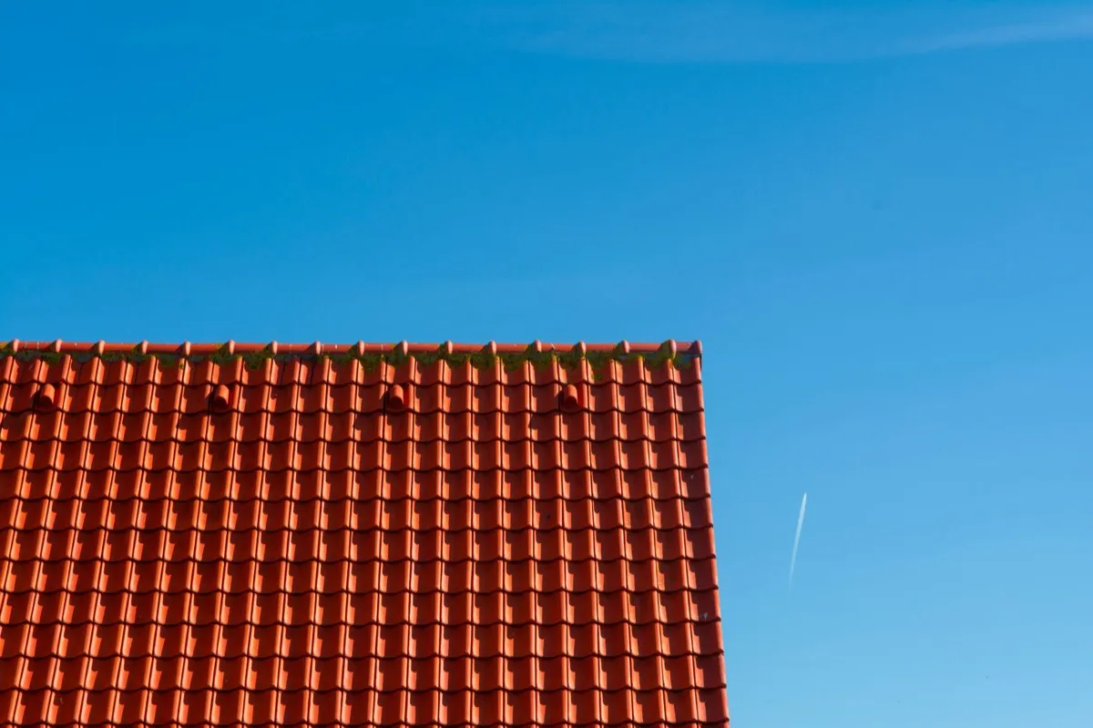 Tile roof gable in full sun, the kind of exposure that sets roof life in Nacogdoches, TX